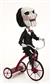 Saw – Head Knocker – Puppet on Tricycle